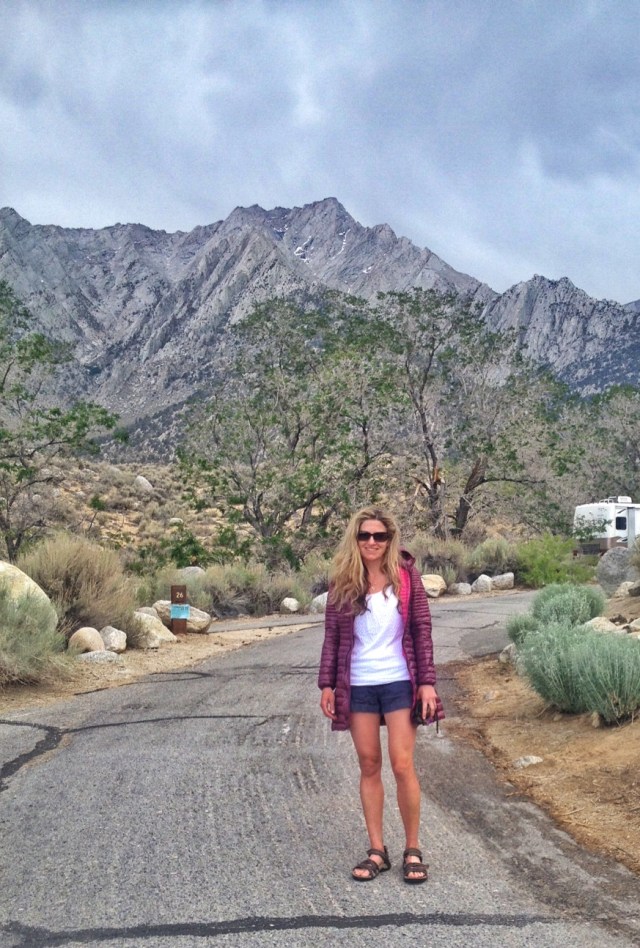 at the campsite, wearing a down jacket  (even though it was about 90 degrees) to warm up from the ice bath in the creek