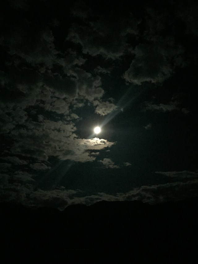 moon over the mountains. oh, and we saw a shooting star about halfway across the lake...